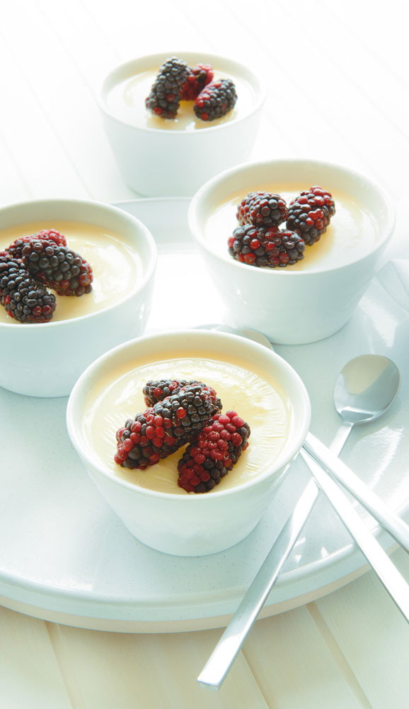Frozen sherbit cream glaze and fresh black berries
