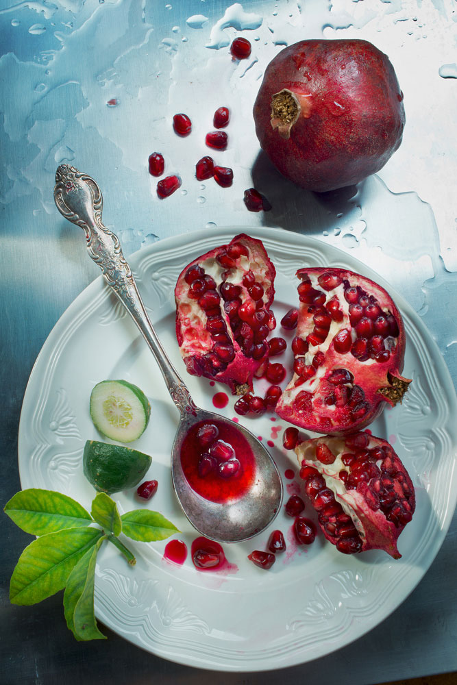 Fresh pomegranates and bitter limes