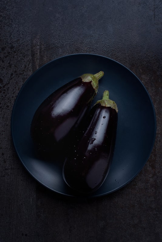 Still life eggplant with water droplets